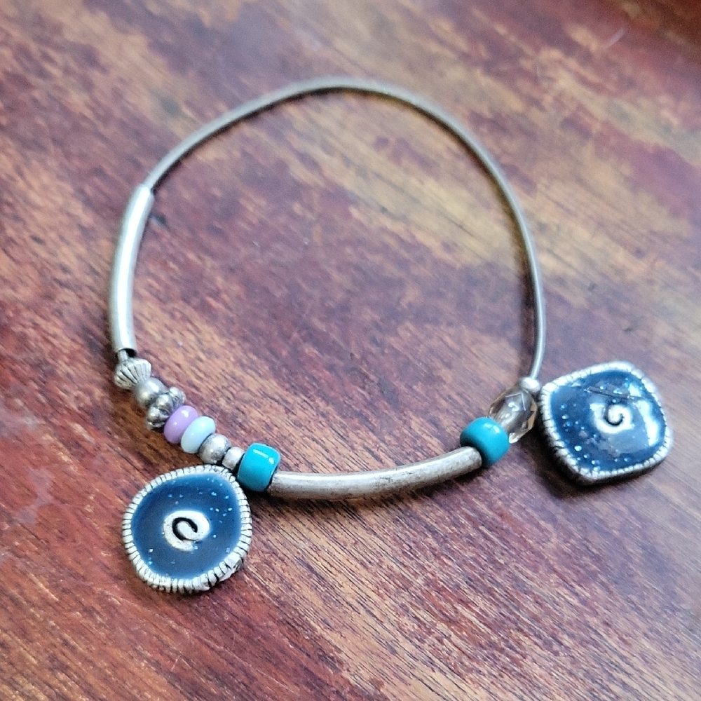 Avon Silver and Blue Stretch Charm Bracelet